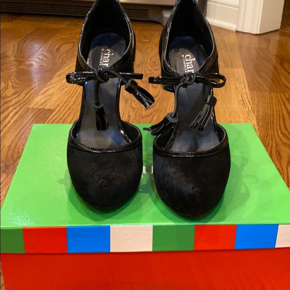 Black calf hair tasseled covered platform heels